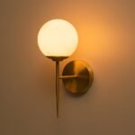 Mid-Century 1-Light Brass Frosted Glass Globe Wall Sconce